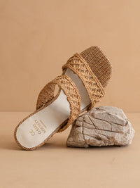 Close up of woven raffia double band design on neutral heel
