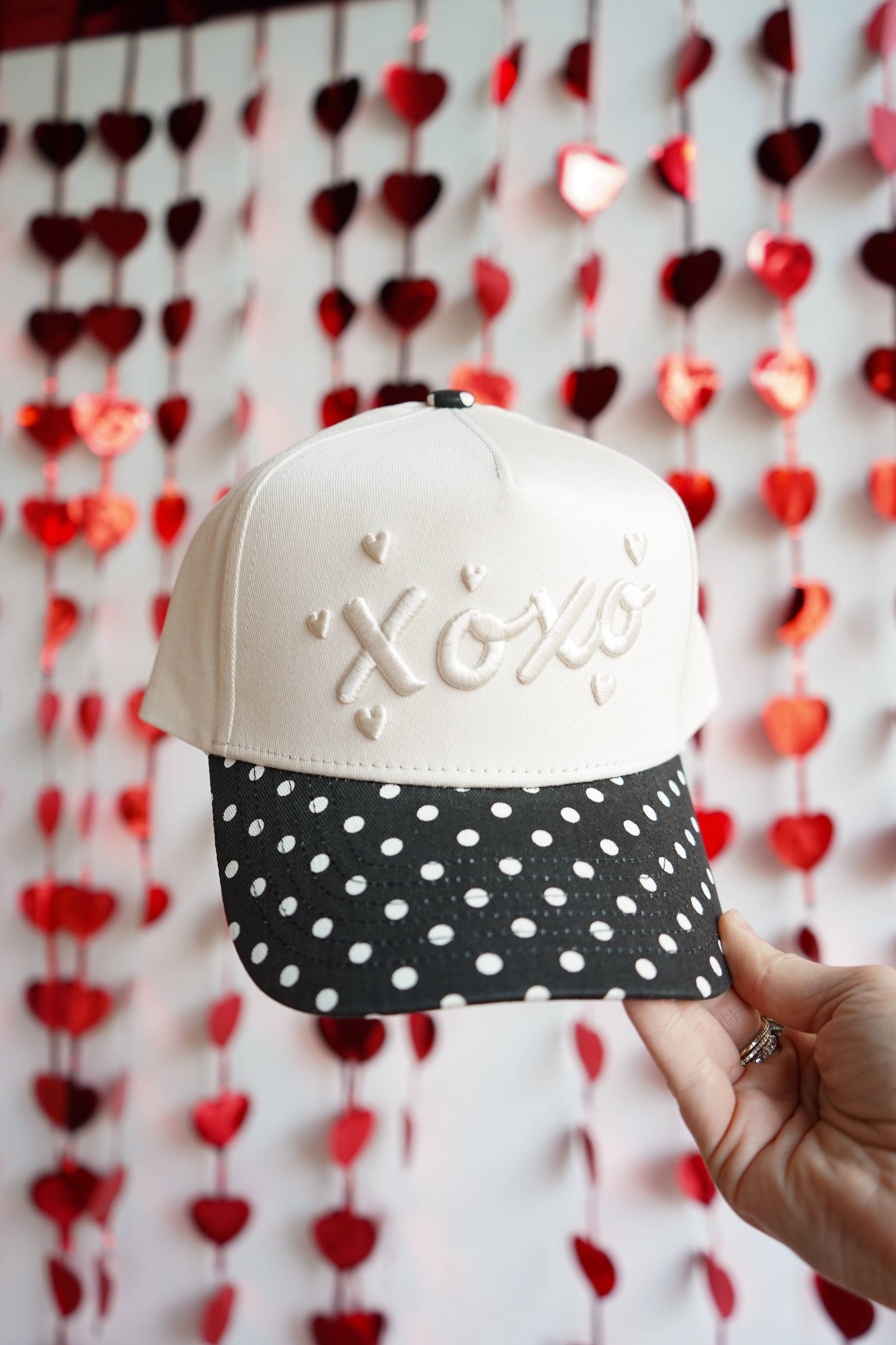 XOXO polka dot trucker hat styled for casual wear