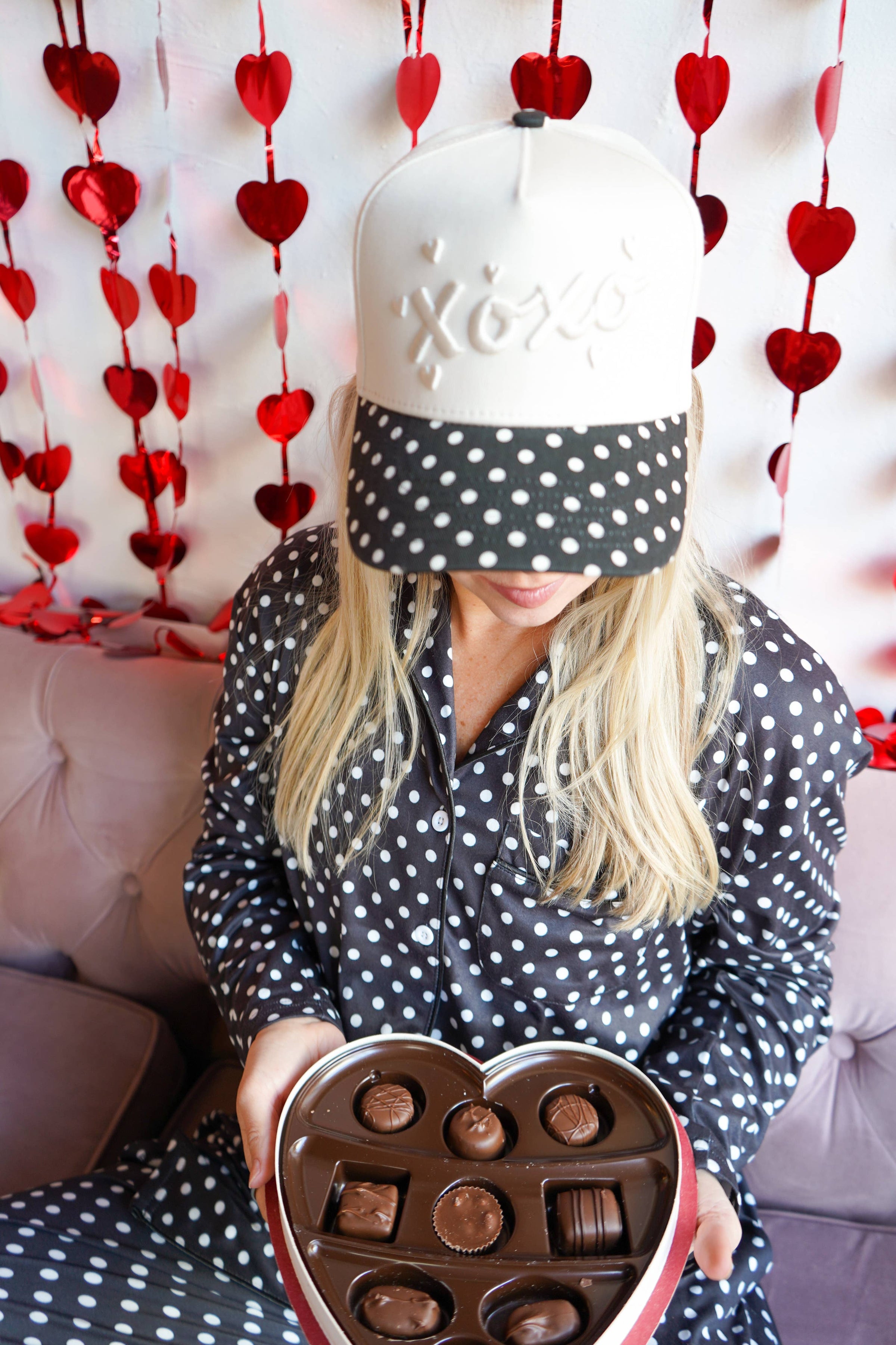 Black polka dot vintage trucker hat with XOXO embroidery